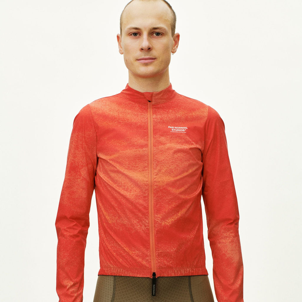 Mechanism Stow Away Jacket - AOP Hibiscus Orange
