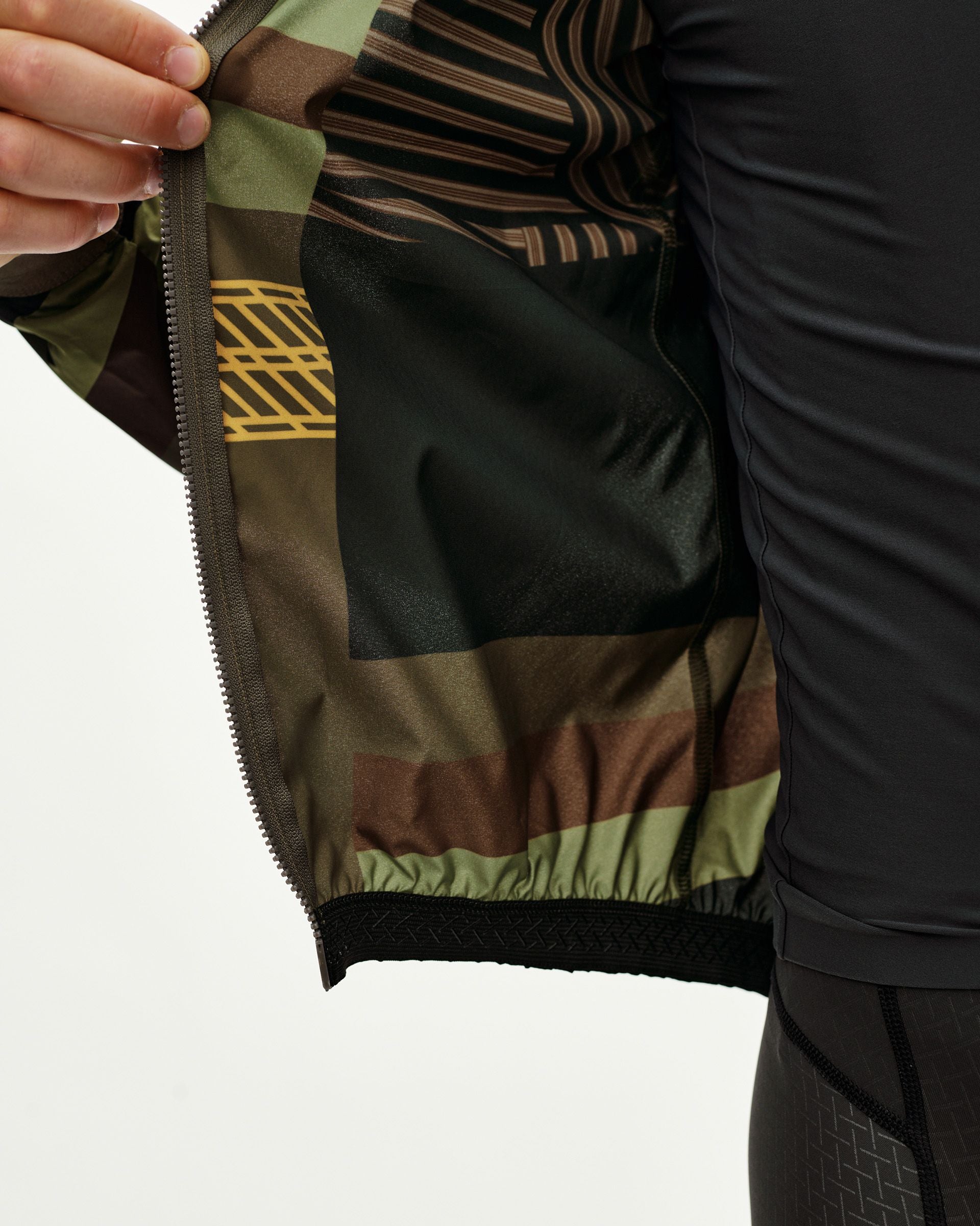 Mechanism Stow Away Jacket - AOP International Green