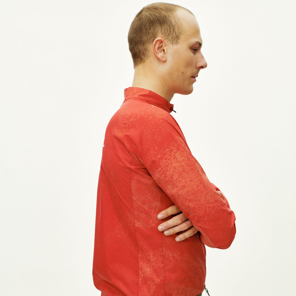 Mechanism Stow Away Jacket - AOP Hibiscus Orange