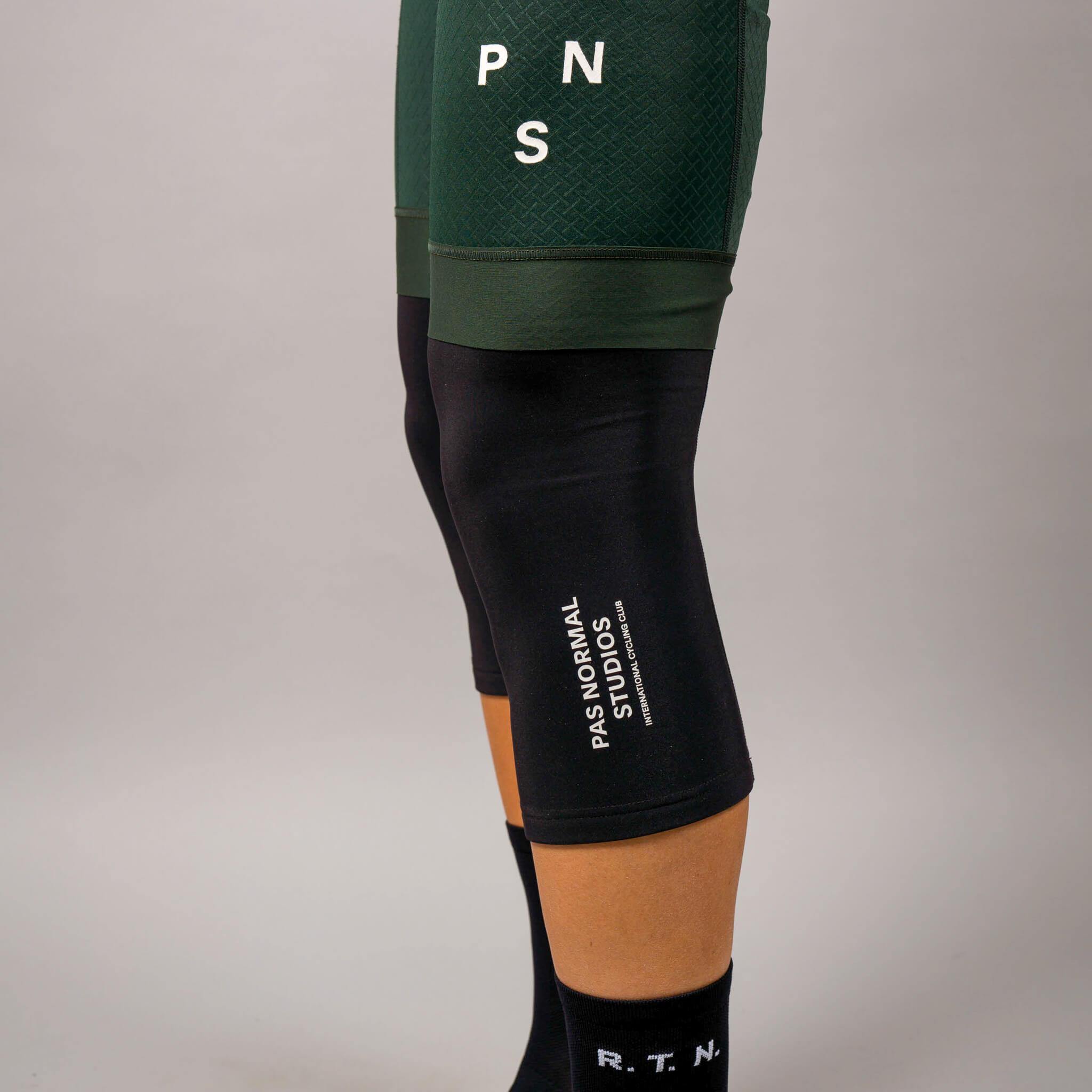 Pas Normal Studios Logo Knee Warmers - Black – Cranks & Coffee